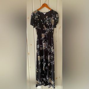 Sheer black floral maxi dress with split skirt/shorts and butterfly sleeves.